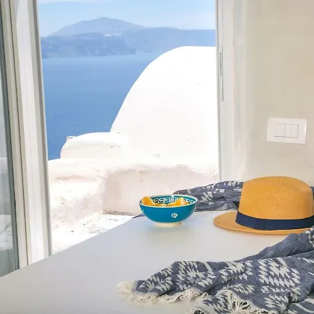 Nyaraló White Cave House Ía